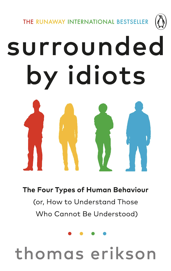 Book cover of surrounded by idiots in black text with four image silhouettes in red, green, blue and yellow