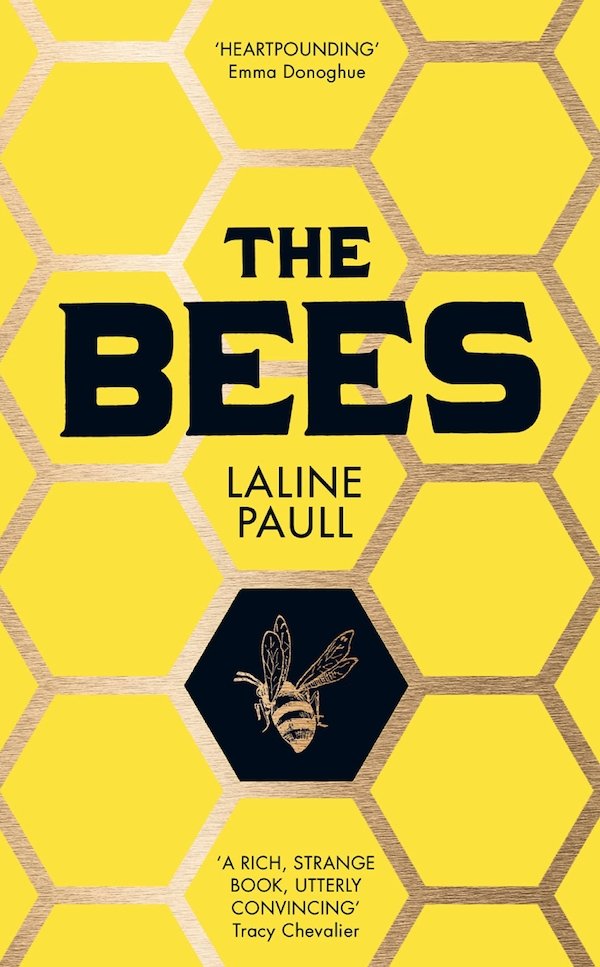 Book cover of The Bees showing a background image of a yellow bee hive with black lettering