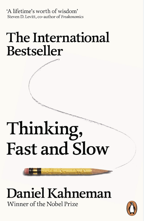 Book cover of Thinking fast and slow in black text with a pencil feature image